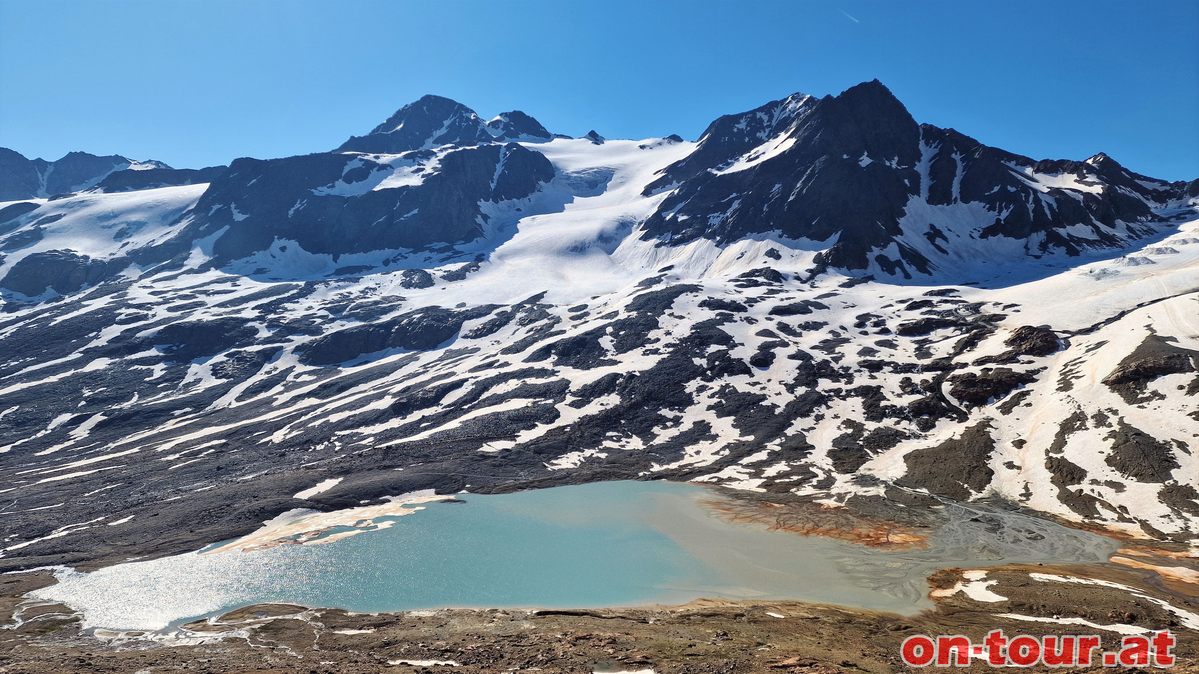 Abstieg ber Bella Vista Htte mit Blick zum Gletschersee und der Finailspitze.